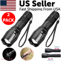 Two black flashlights with zoom capabilities on a white background, labeled as a 2-pack from a US seller with fast shipping.