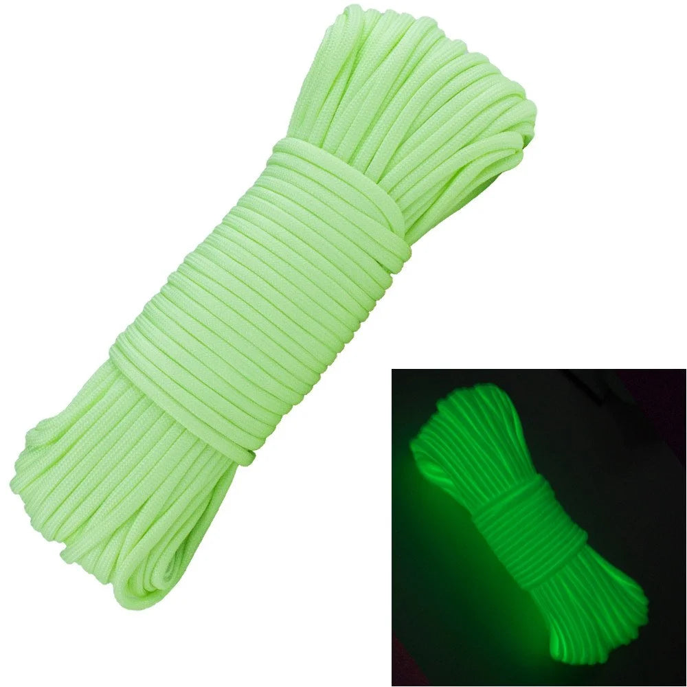 Green paracord coiled on a white background with a dark inset showing its glow-in-the-dark property.
