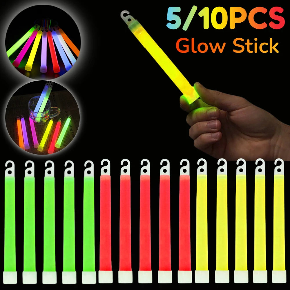 Five glow-in-the-dark stick lighters shown in multiple neon colors on a black background, with a hand holding one yellow-green stick on the right and two circular inset photos showing the glow effect. Text at the top reads '5/10PCS Glow Stick'.
