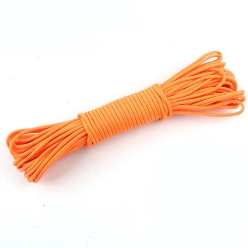 Bunch of orange elastic bands on a white background