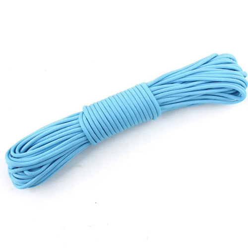 Coiled light blue rope on a white background